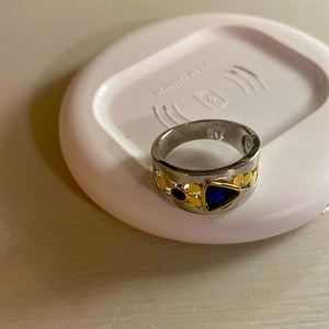 Size 9. Women’s ring.  Silver/gold with blue stones.